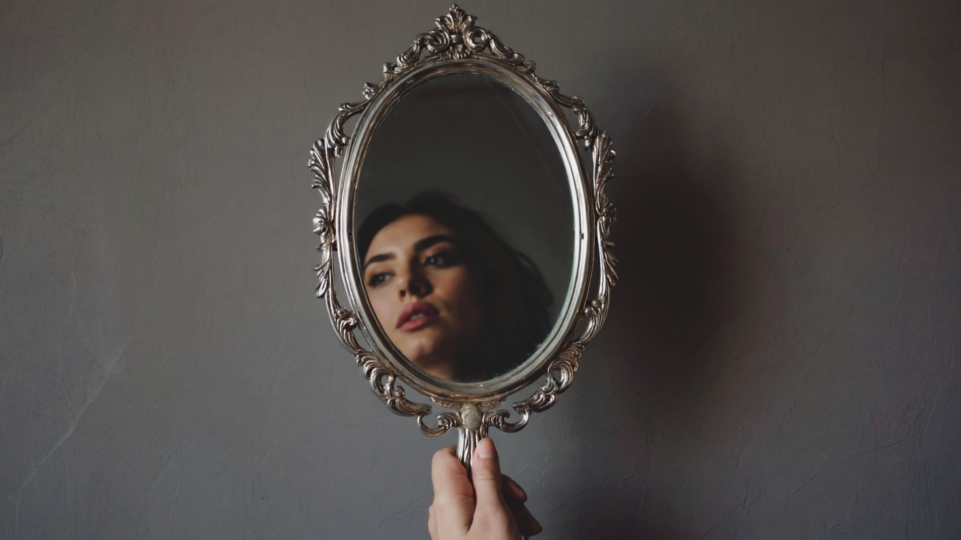 Frames minimalist editorial aesthetic  ornate silver hand mirror with the r s-354353, a-2, 16192188.png