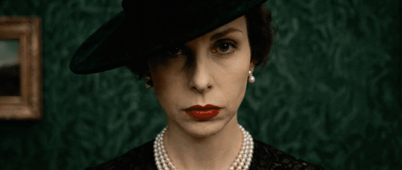 Gen-4_5 1 whip pan to painting of a fox2 whip pan back to the woman with a curious expression3 whip pan back to the fox painting, the fox is moving 3855905079 (1).gif