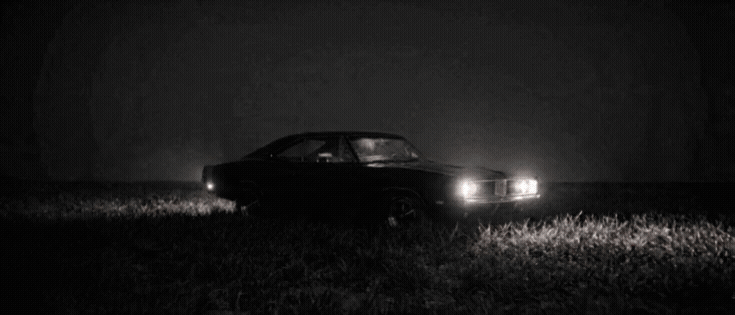 Seedance 20 - cinematic multishot of the car performing tricks in the vast field.gif