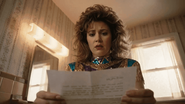 Gemini Omni Flash - change her outfit to match the sequined outfit in _Image 1.gif
